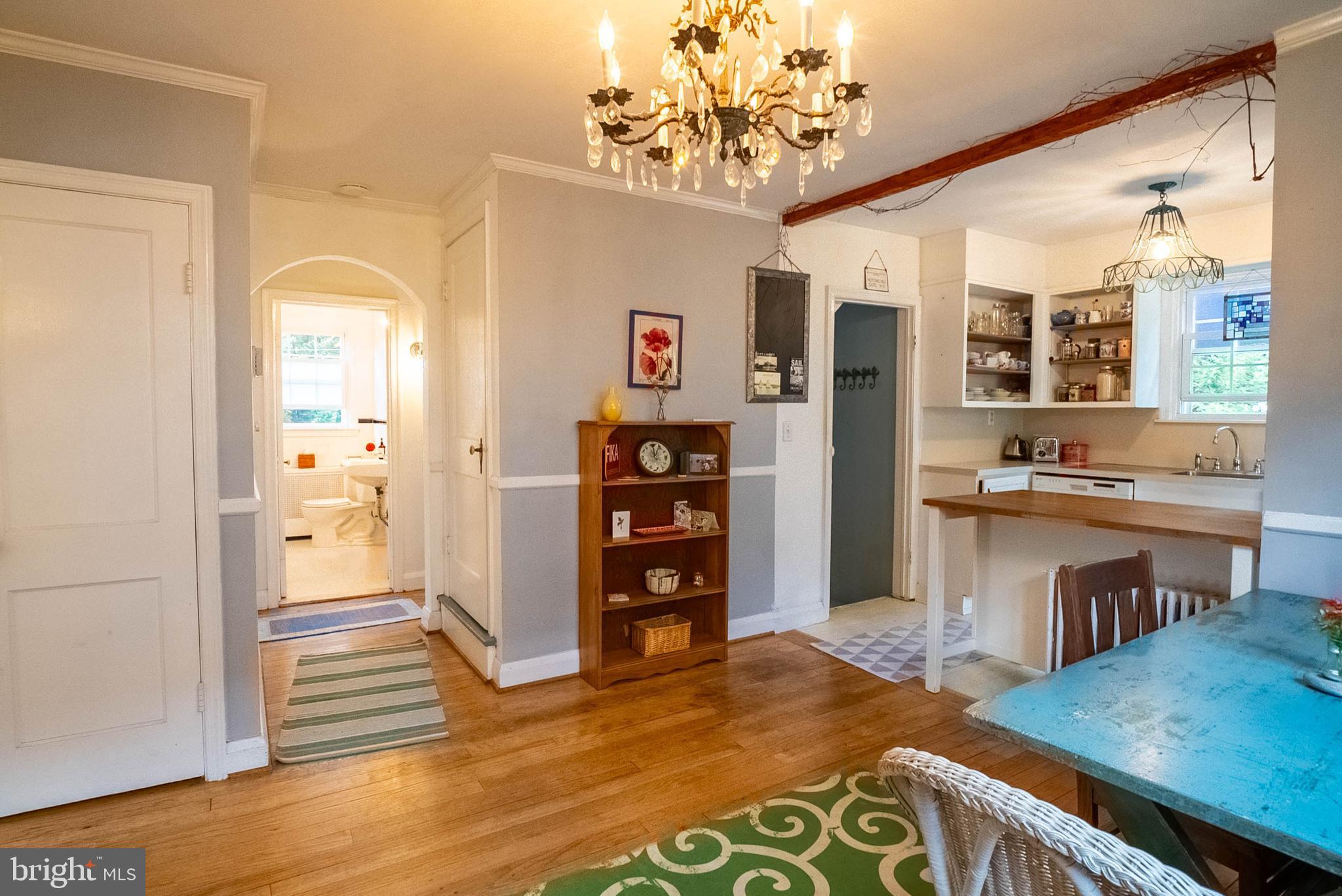 6400 Crestwood Road Baltimore, MD 21239 - Photo 11 of 39 a kitchen with stainless steel appliances granite countertop a refrigerator and a stove top oven