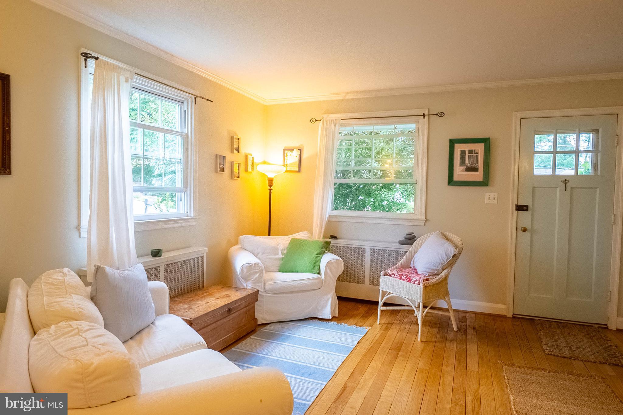 6400 Crestwood Road Baltimore, MD 21239 - Photo 13 of 39 a living room with furniture and a window