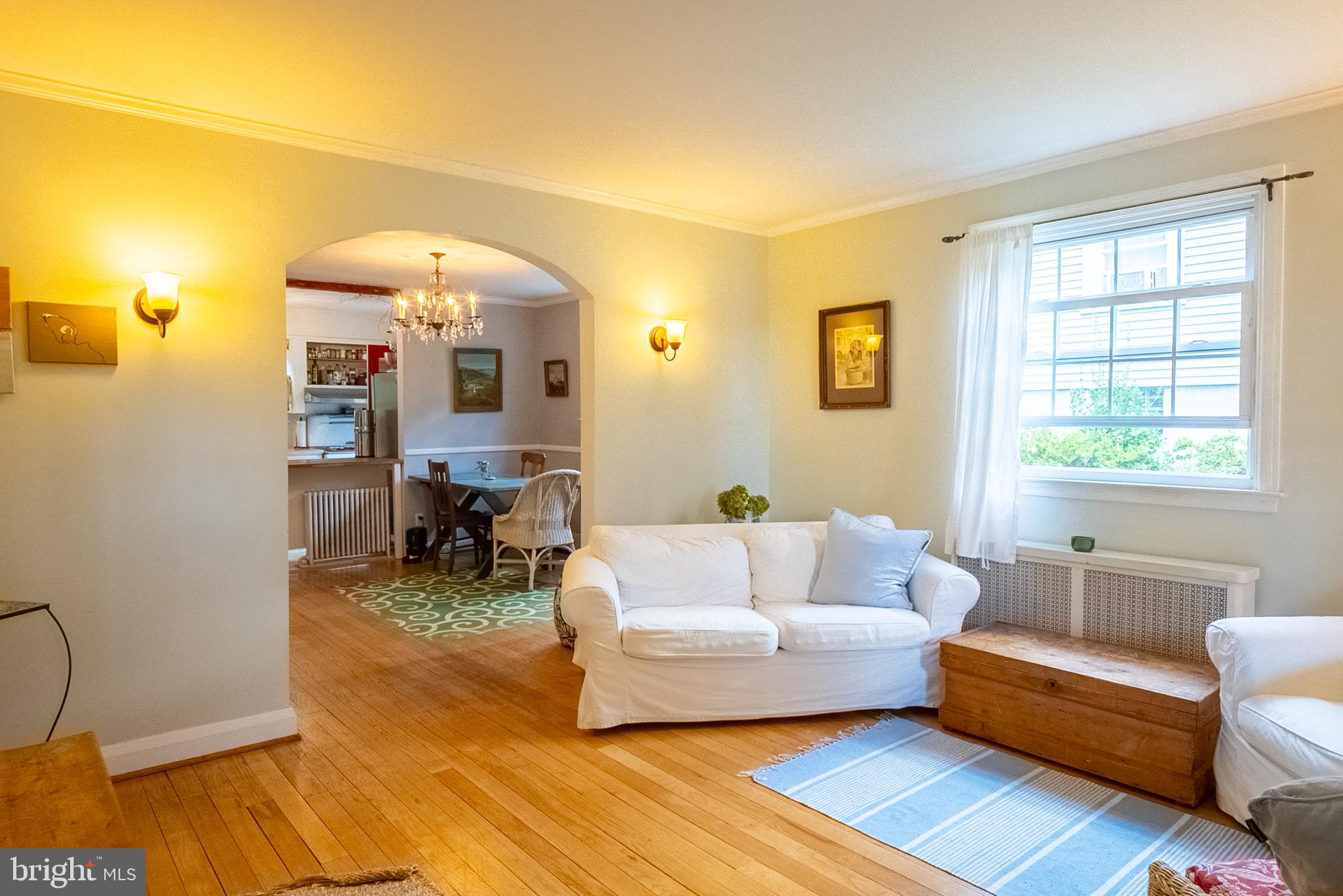 6400 Crestwood Road Baltimore, MD 21239 - Photo 14 of 39 a living room with furniture and a window