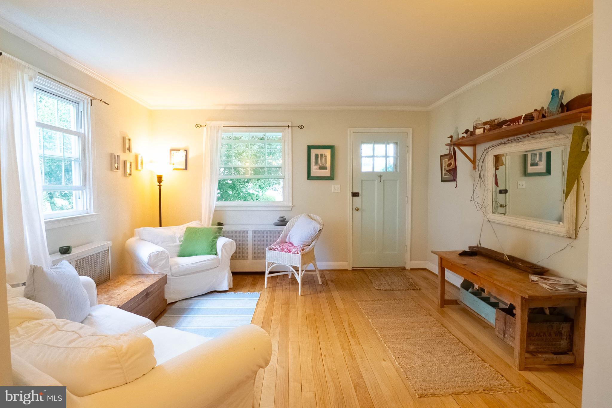 6400 Crestwood Road Baltimore, MD 21239 - Photo 15 of 39 a living room with furniture rug and window