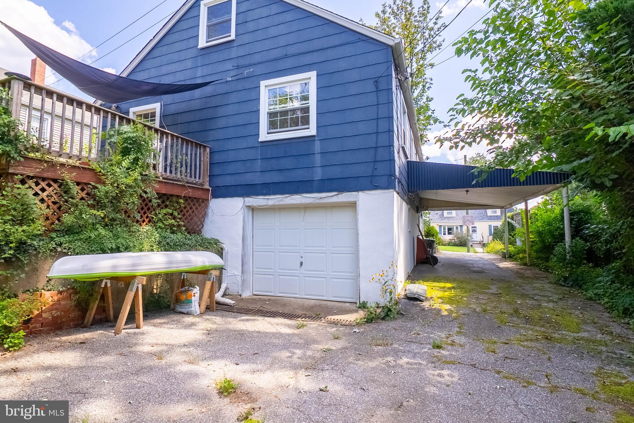6400 Crestwood Road Baltimore, MD 21239 - Photo 33 of 39 a view of a house with a patio