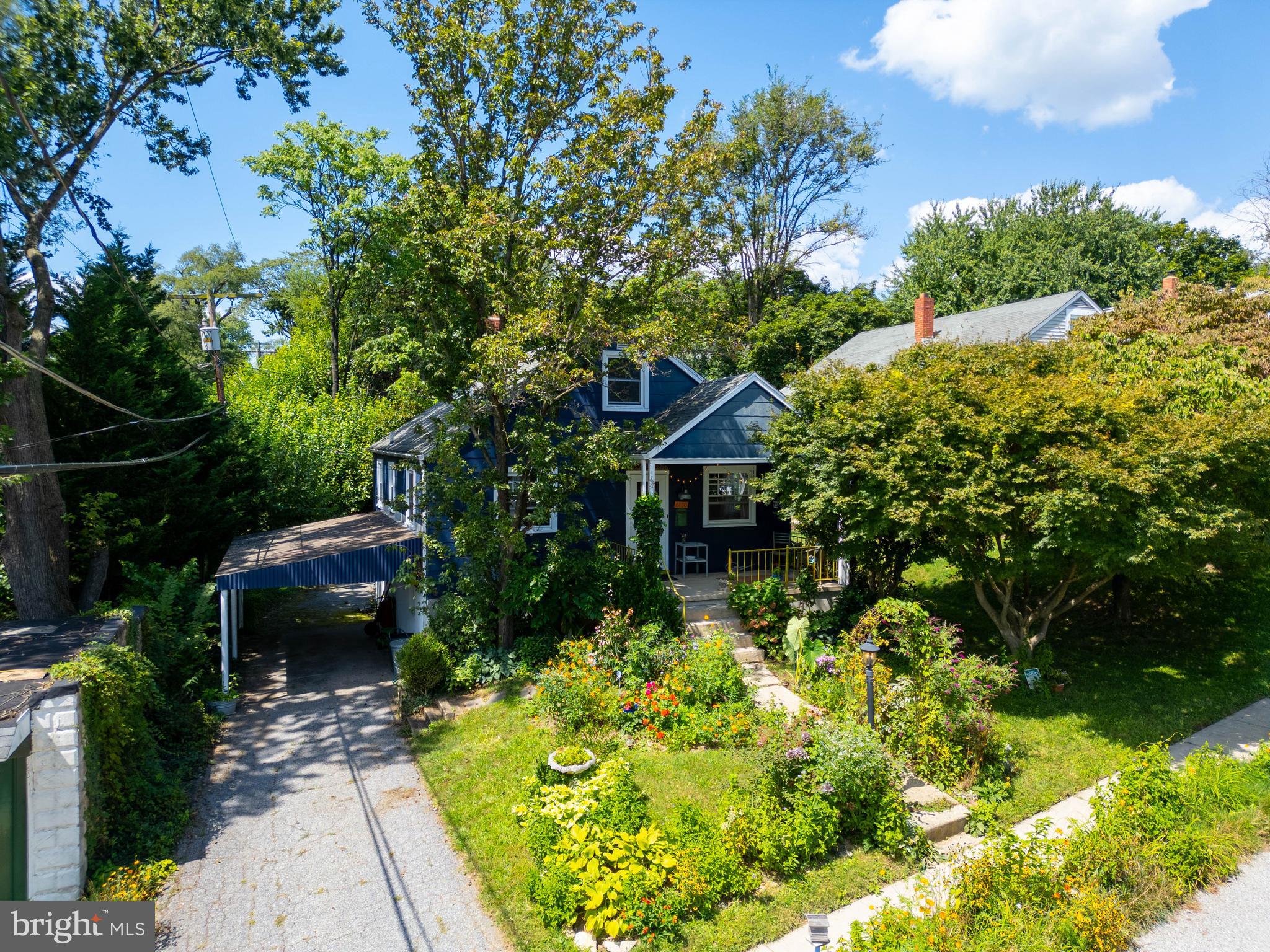 6400 Crestwood Road Baltimore, MD 21239 - Photo 9 of 39 a front view of a house with a yard