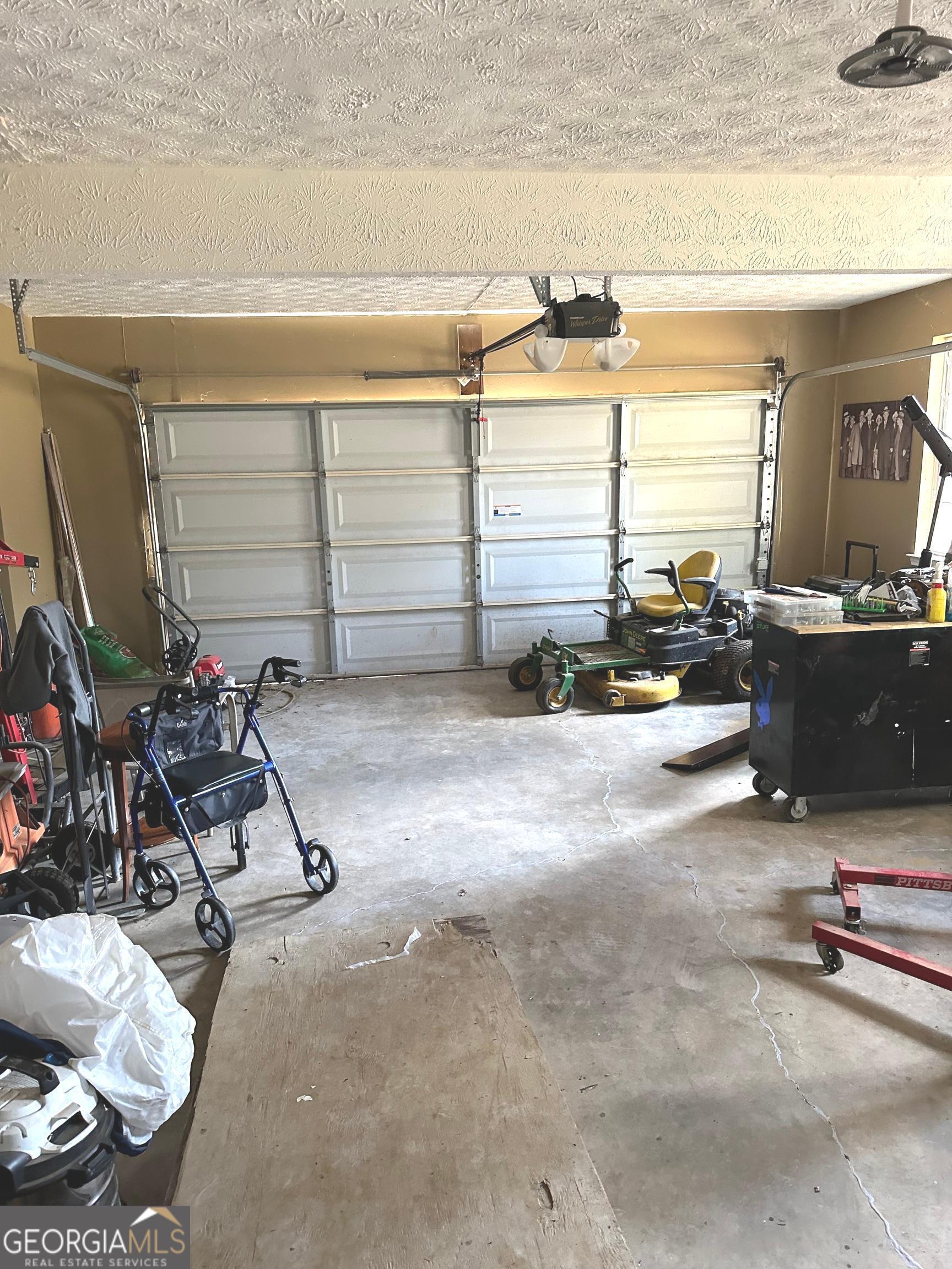 170 Ashley Trace Drive Locust Grove, GA 30248 - Photo 17 of 17 a view of a room with gym equipment