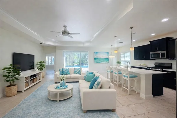 a kitchen with stainless steel appliances a stove sink and microwave