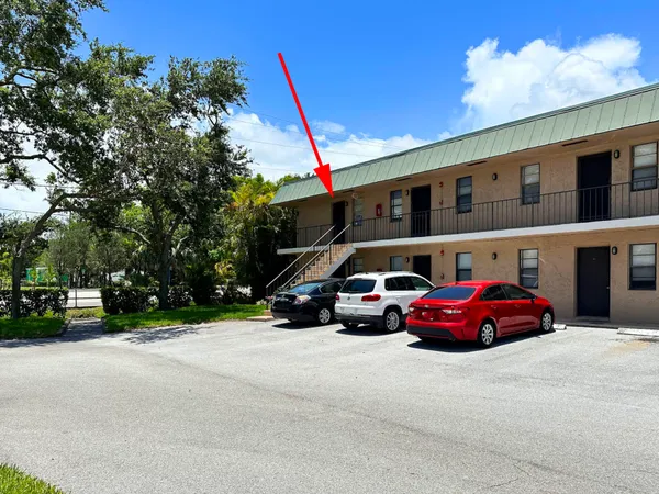 a car parked in front of a building