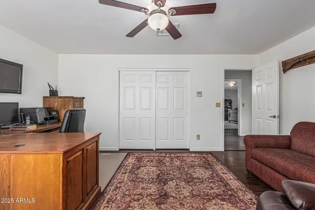 a kitchen with stainless steel appliances granite countertop a refrigerator and a stove