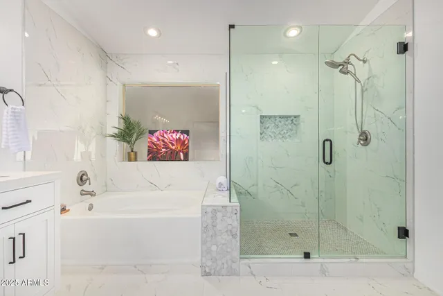 a balcony with table and chairs