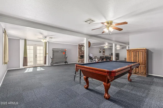 an aerial view of a residential houses with city view
