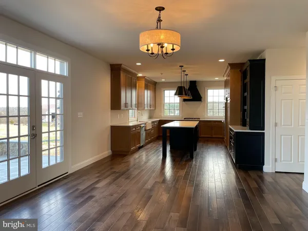 a view of a kitchen and dining room