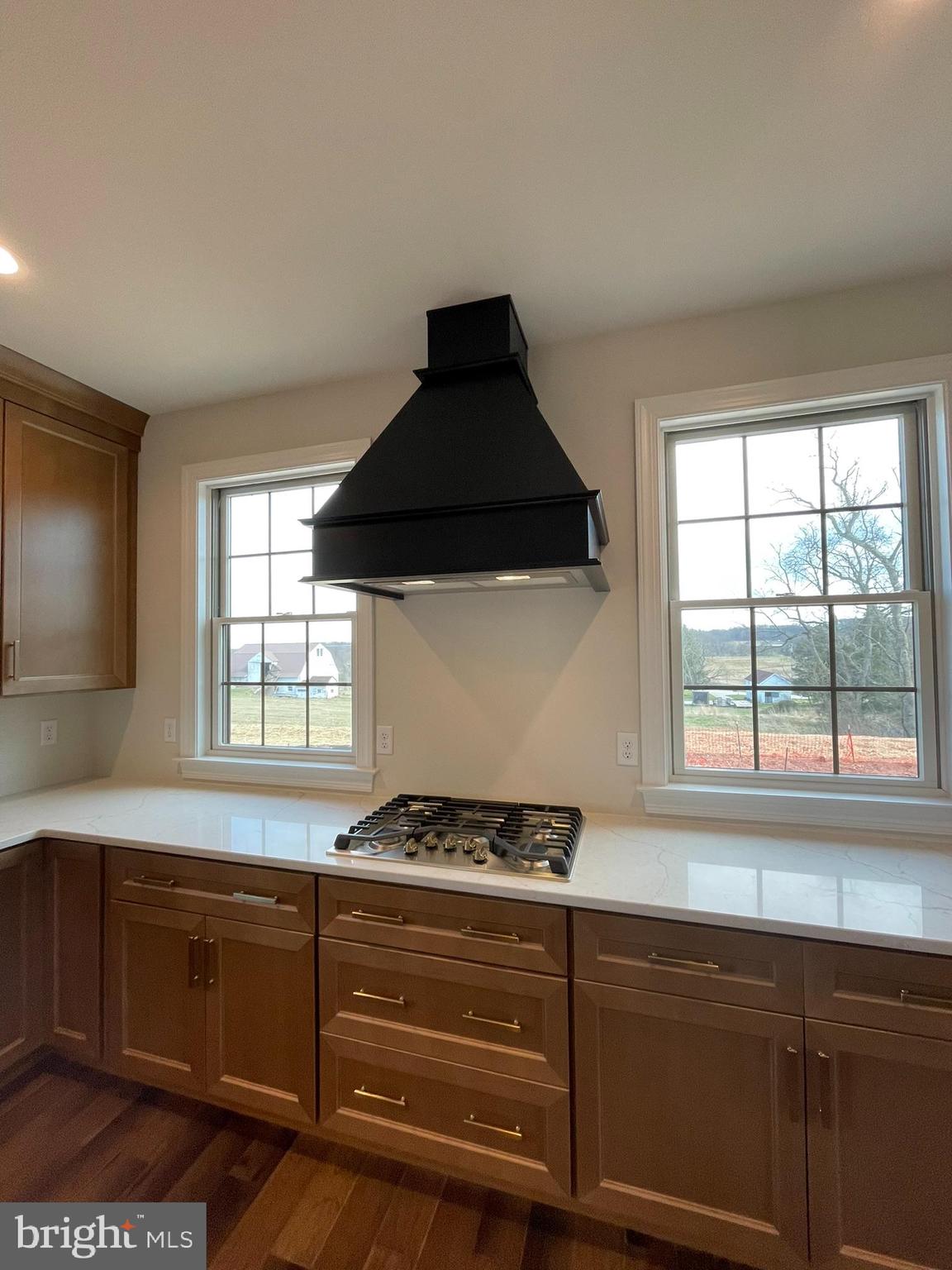 1928 Kimberton Road Phoenixville, PA 19460 - Photo 13 of 32 a kitchen with granite countertop a stove and a sink