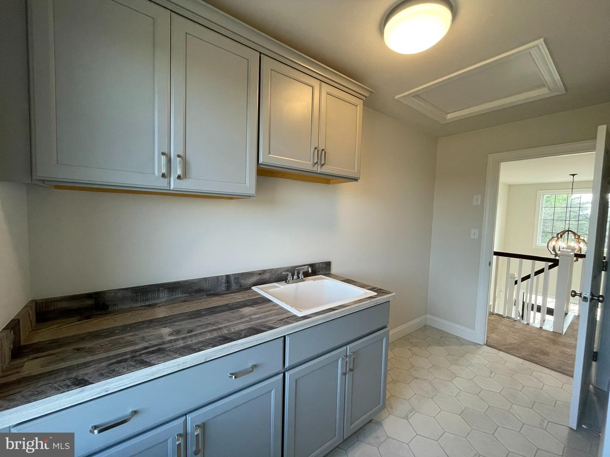 1928 Kimberton Road Phoenixville, PA 19460 - Photo 14 of 32 a room with a sink and cabinets
