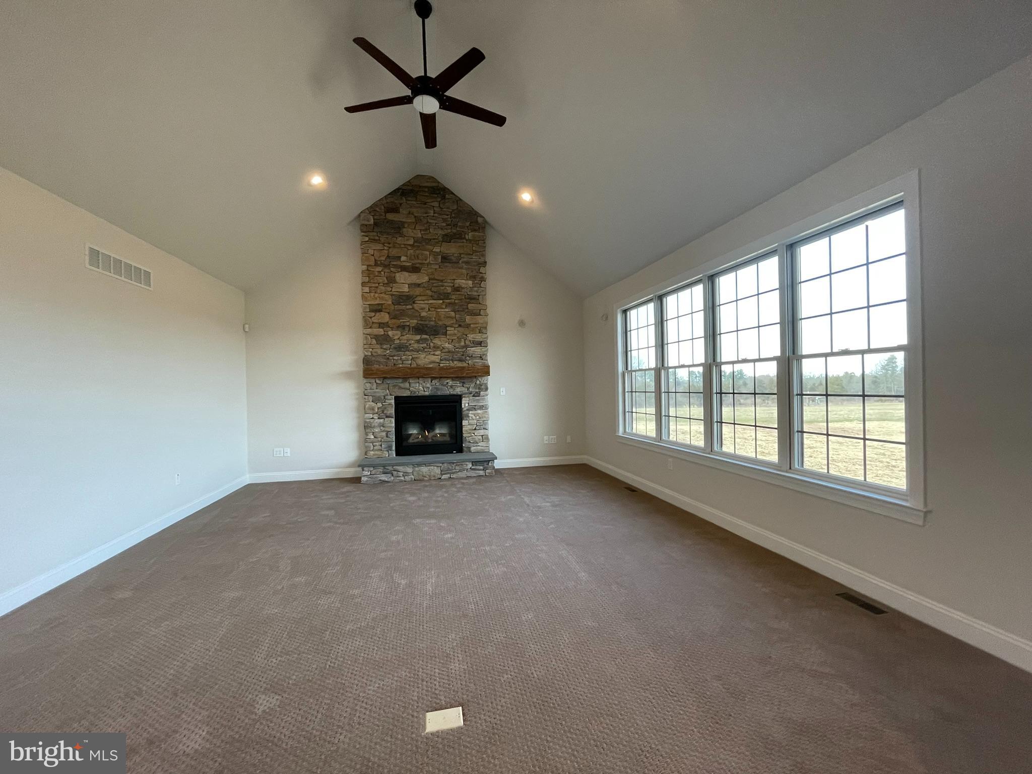 1928 Kimberton Road Phoenixville, PA 19460 - Photo 20 of 32 a view of an empty room with a fireplace and a window