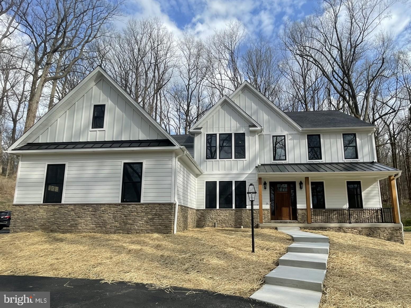1928 Kimberton Road Phoenixville, PA 19460 - Photo 2 of 32 a front view of a house with a yard