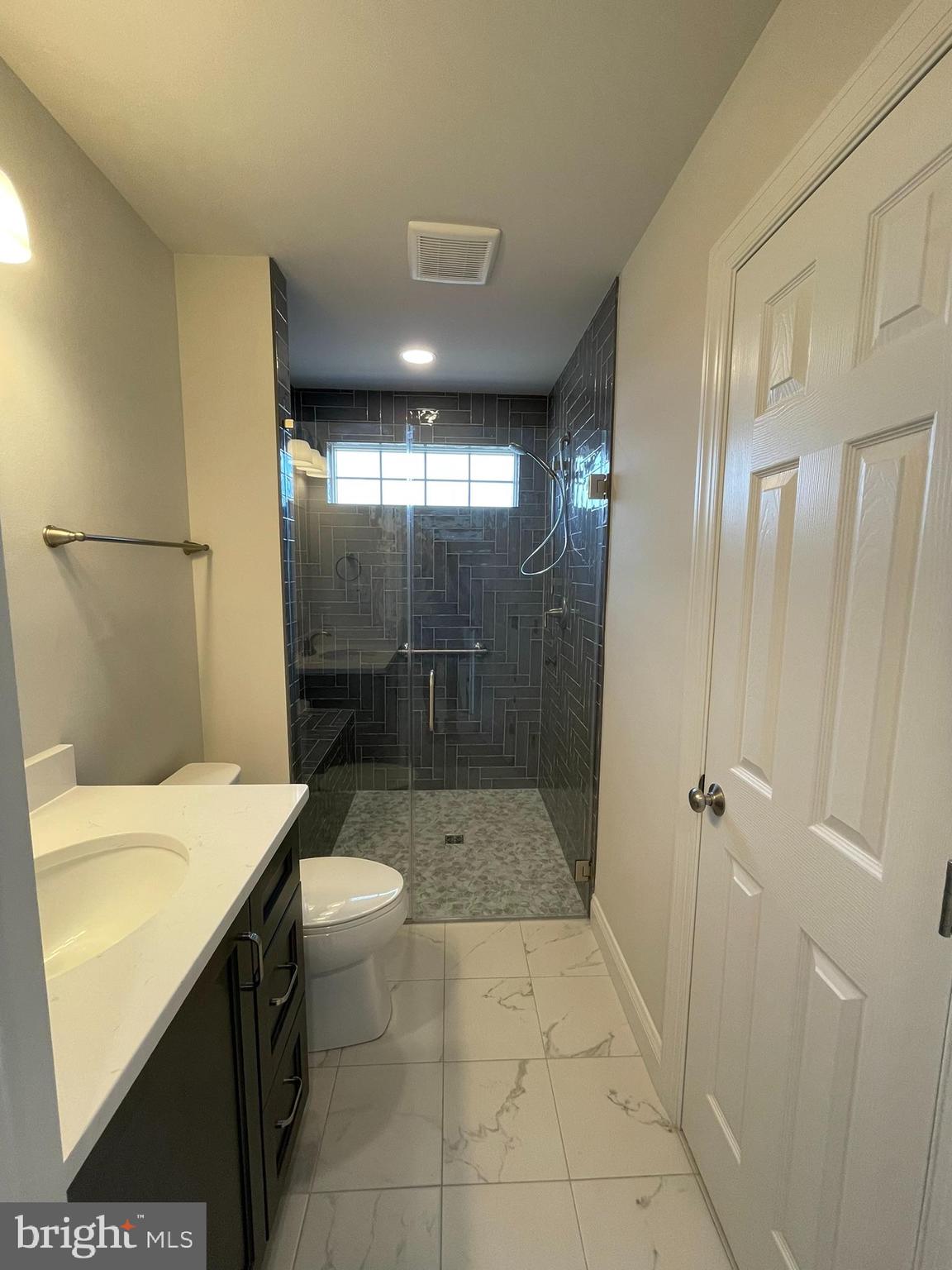 1928 Kimberton Road Phoenixville, PA 19460 - Photo 24 of 32 a bathroom with a sink a toilet and shower