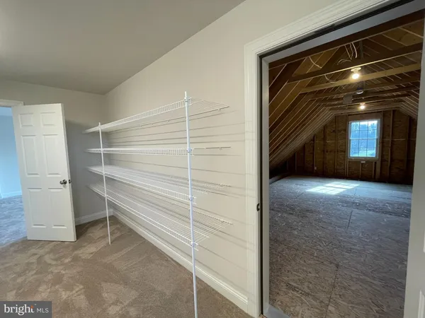 a spacious bathroom with a bathtub and a shower