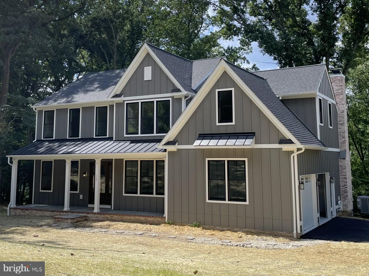 1928 Kimberton Road Phoenixville, PA 19460 - Photo 4 of 32 a front view of a house with a yard and garage