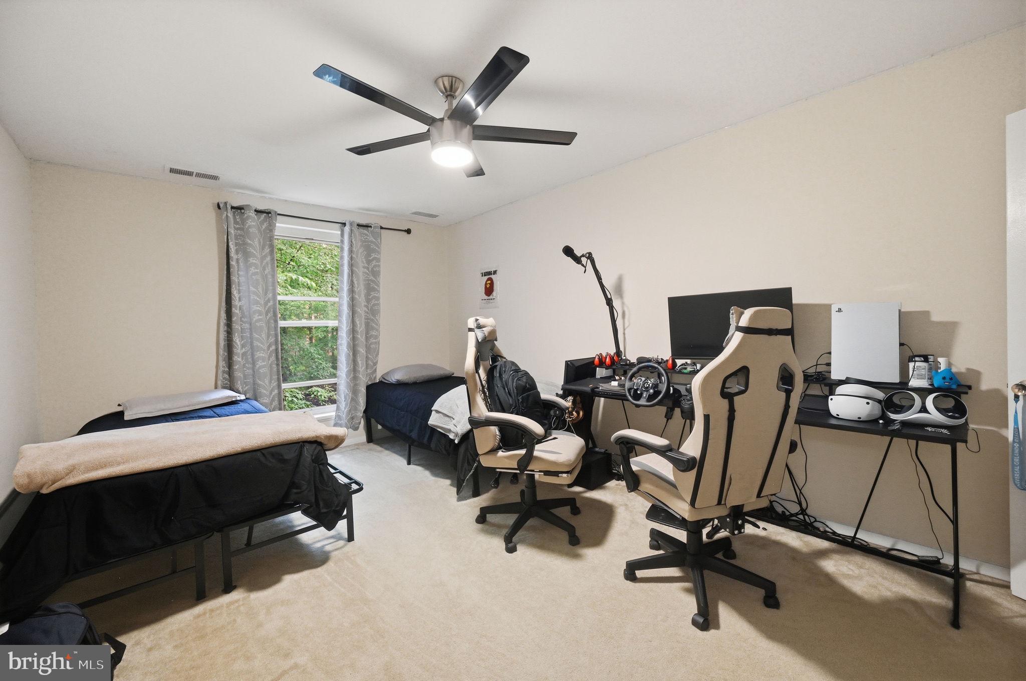 3366 Woodburn Road, Unit 23 Annandale, VA 22003 - Photo 12 of 16 a view of a workspace with furniture and a window
