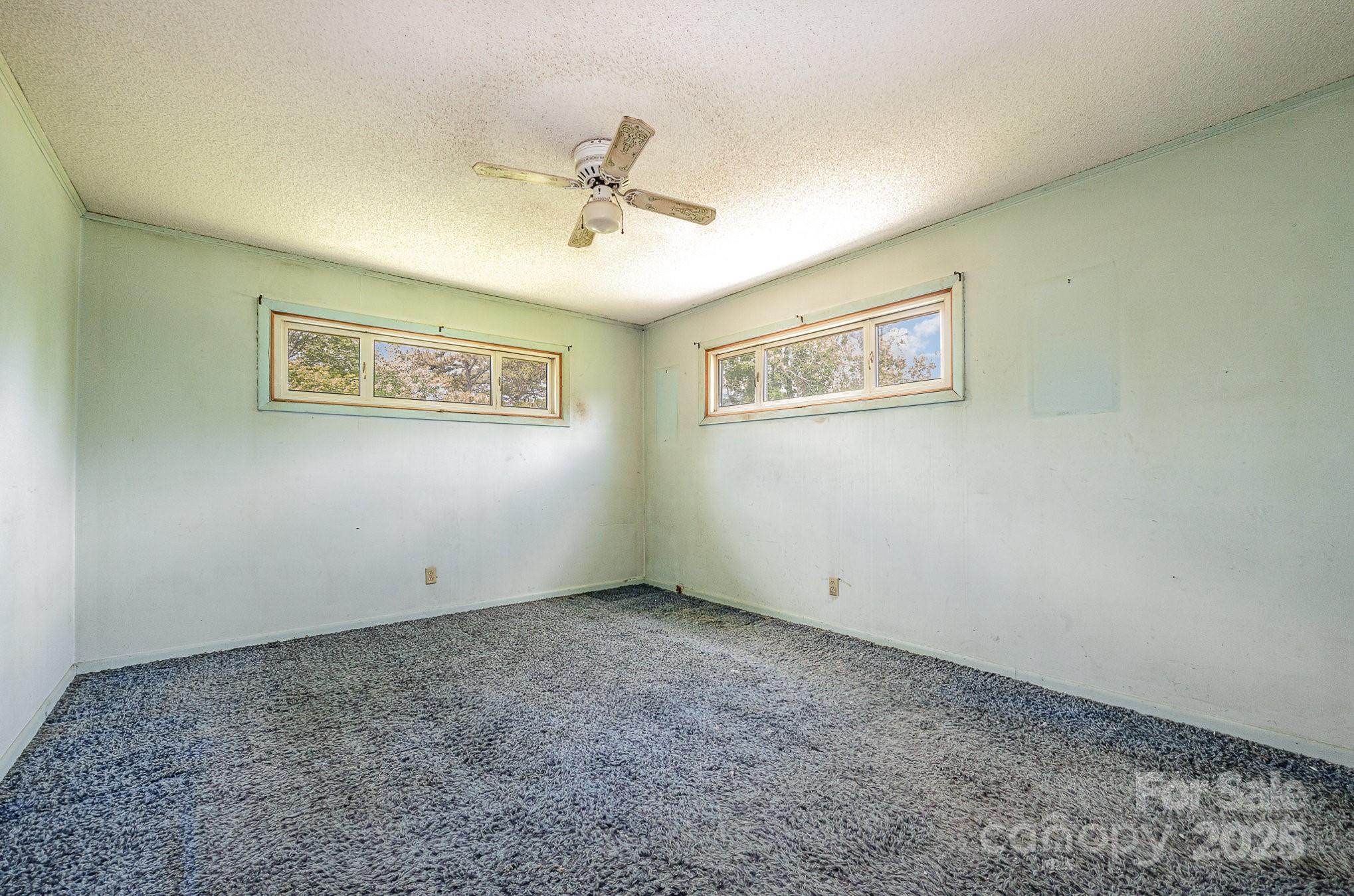 5858 Mundy Road Denver, NC 28037 - Photo 15 of 27 a view of an empty room with a window