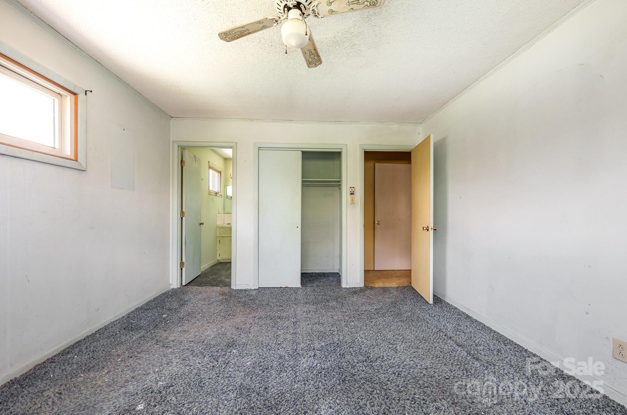 5858 Mundy Road Denver, NC 28037 - Photo 16 of 27 a view of an empty room with a window