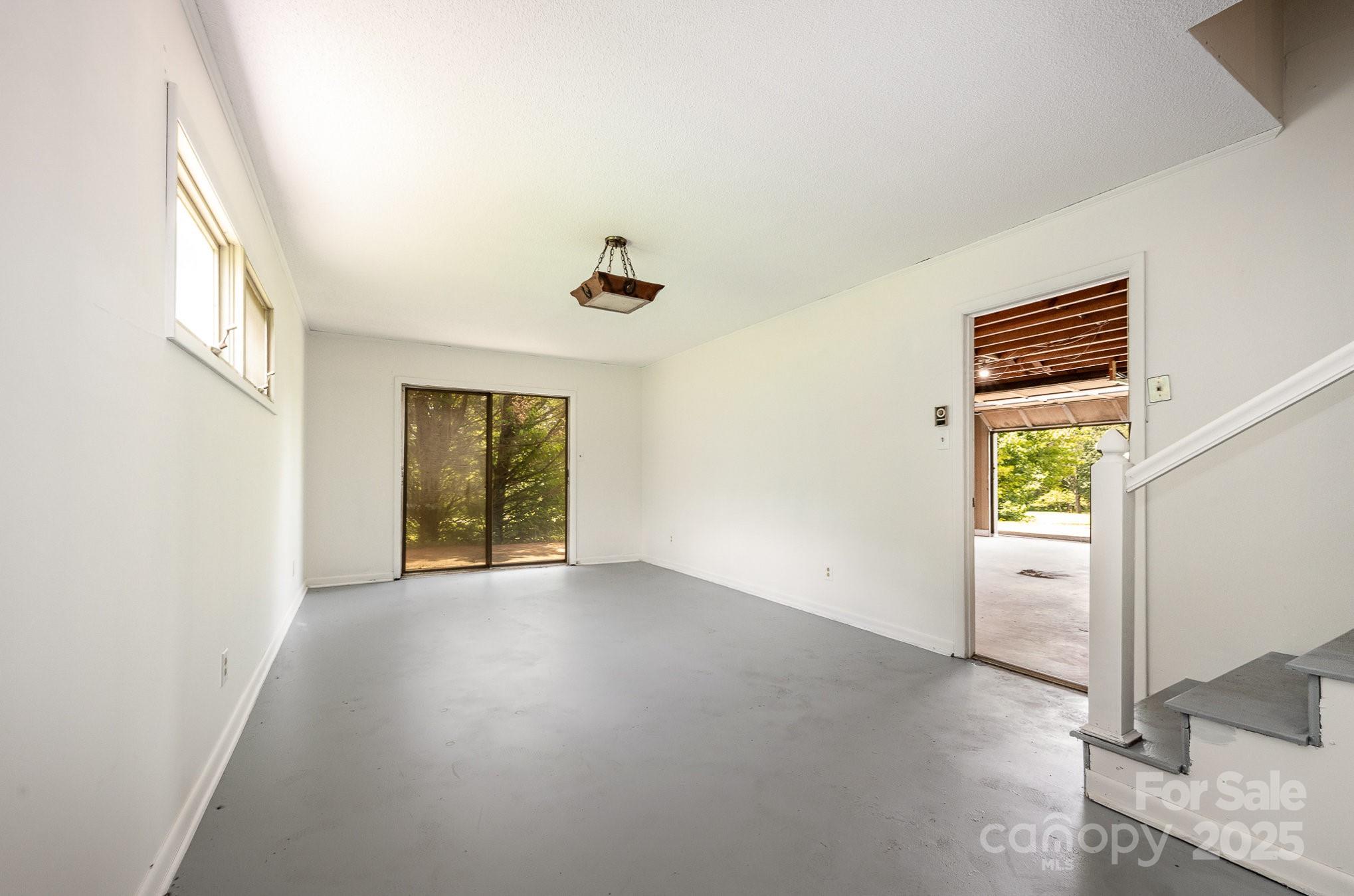 5858 Mundy Road Denver, NC 28037 - Photo 20 of 27 a view of an empty room with a window