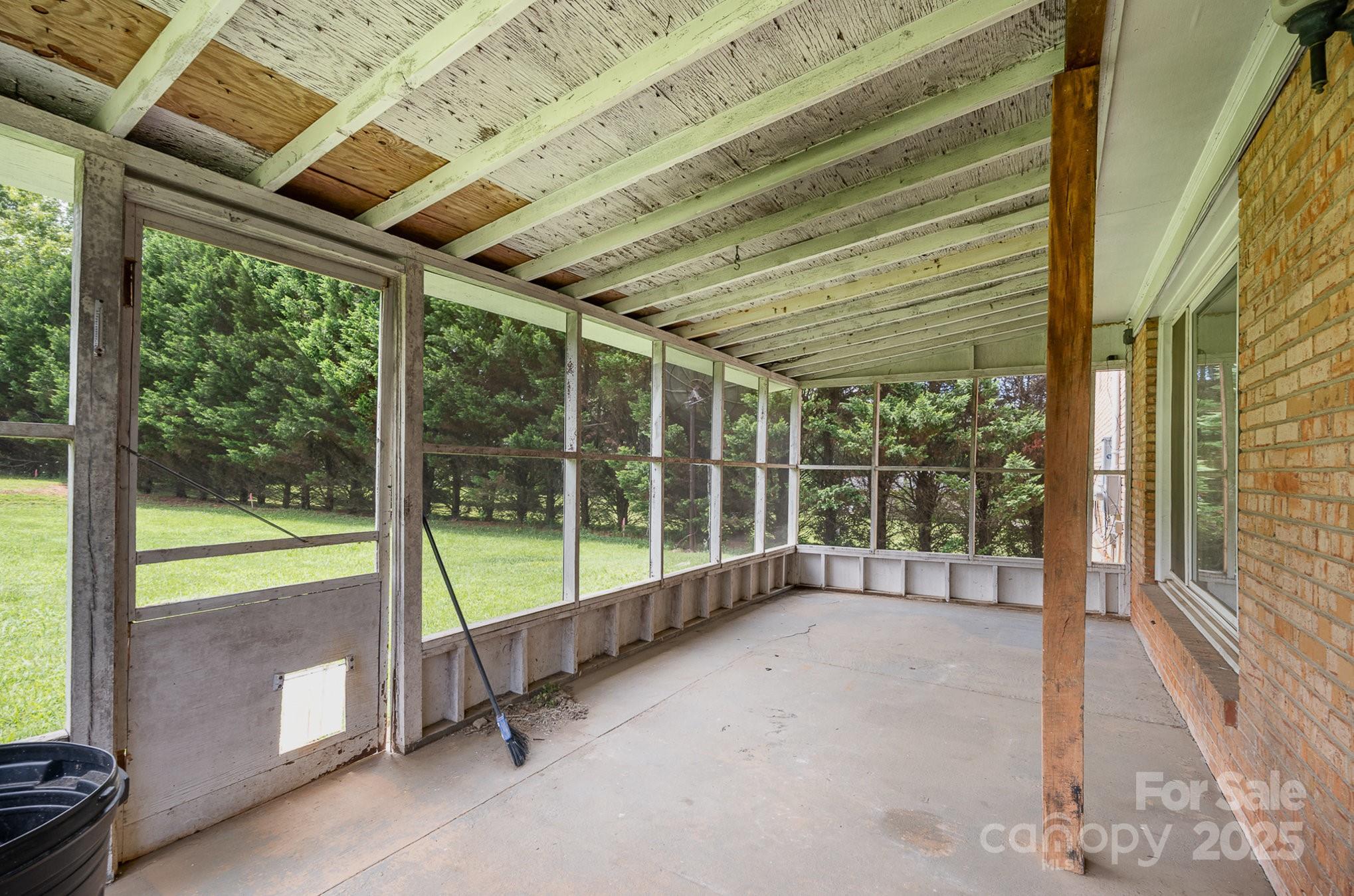 5858 Mundy Road Denver, NC 28037 - Photo 22 of 27 a view of an empty room with a large window