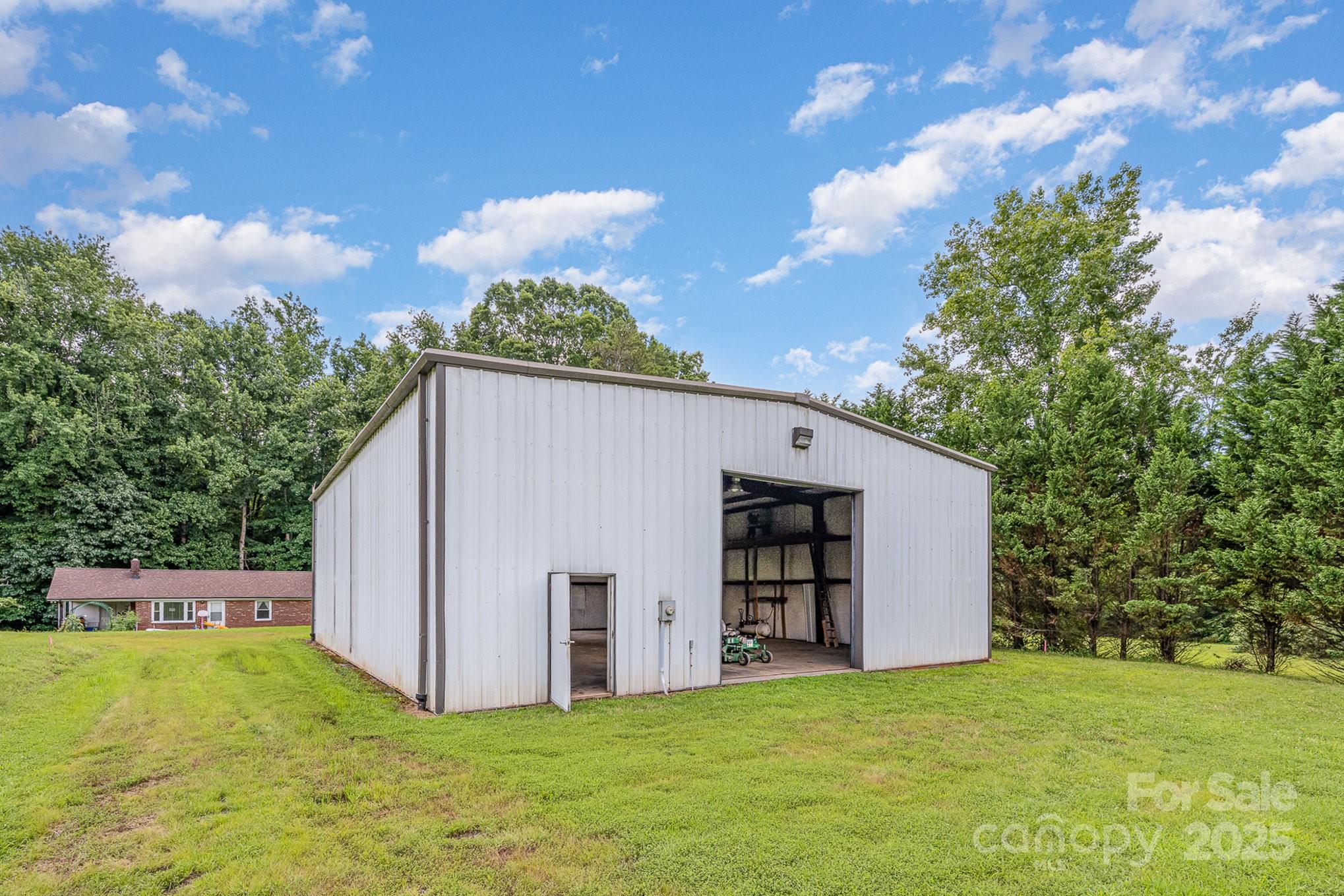 5858 Mundy Road Denver, NC 28037 - Photo 24 of 27 a view of a house with backyard
