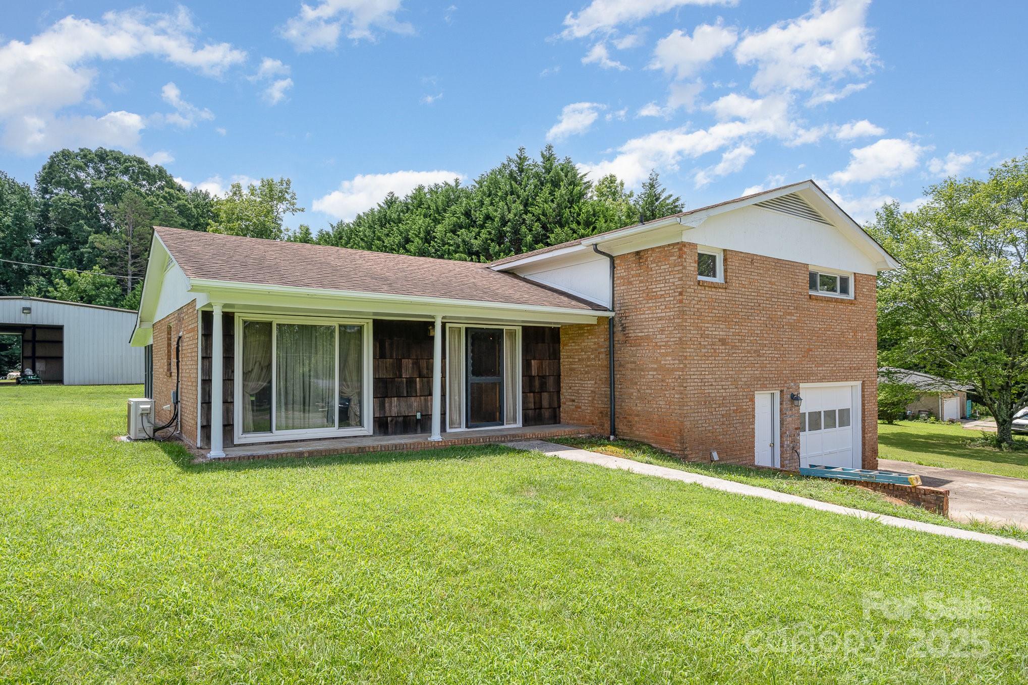 5858 Mundy Road Denver, NC 28037 - Photo 4 of 27 a view of a house with garden and yard