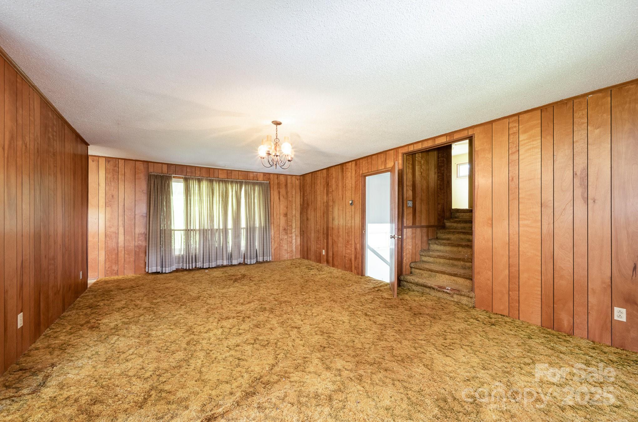 5858 Mundy Road Denver, NC 28037 - Photo 7 of 27 a view of an empty room with a window