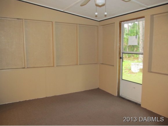 2907 Juniper Drive Edgewater, FL 32141 - Photo 12 of 12 a view of an empty room with a window