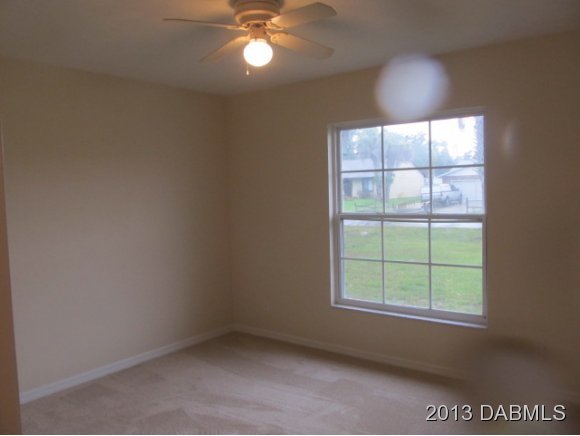 2907 Juniper Drive Edgewater, FL 32141 - Photo 10 of 12 an empty room with a window