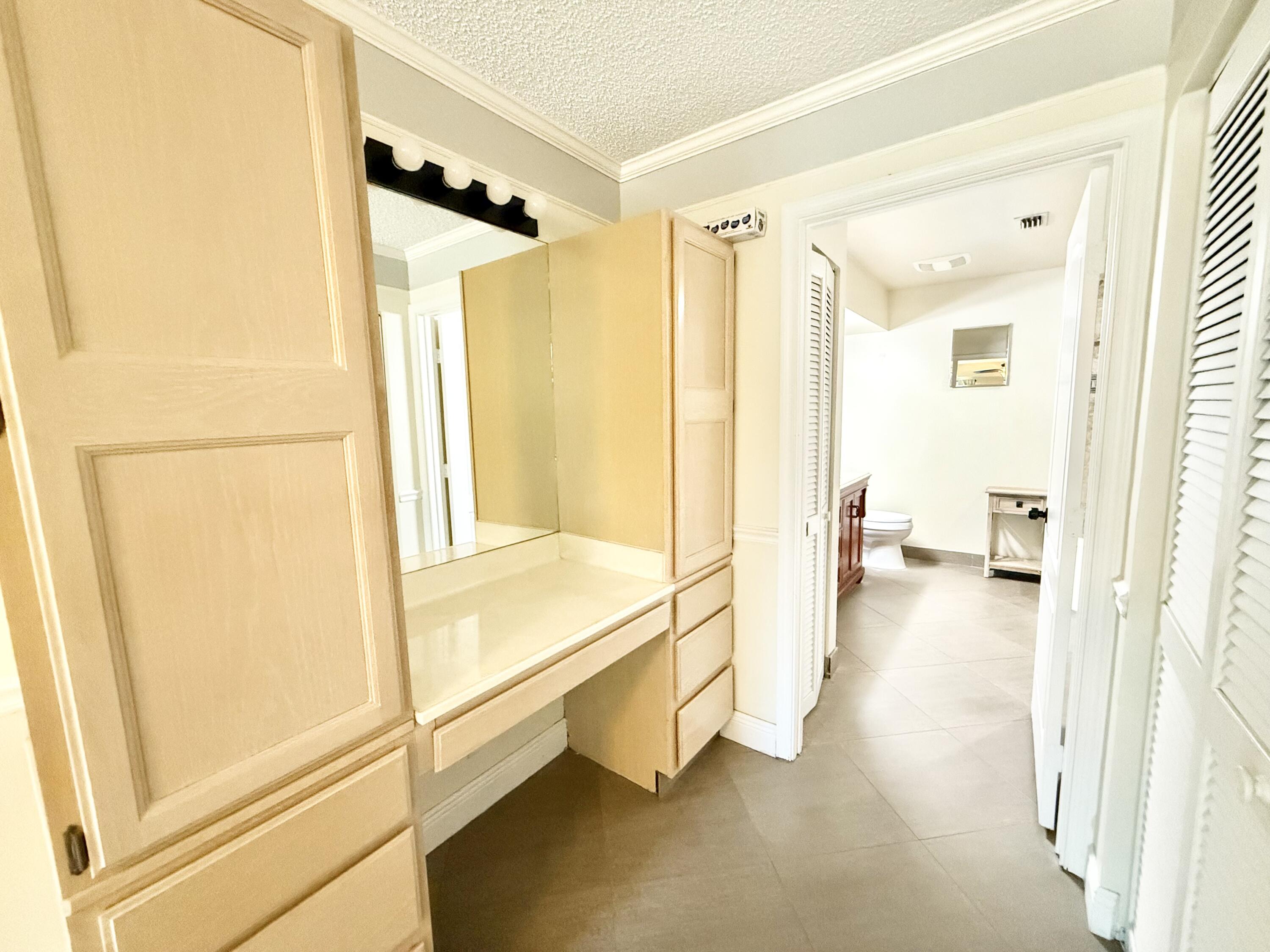 9190 Boca Gardens Parkway, Unit B Boca Raton, FL 33496 - Photo 8 of 35 a bathroom with a tub and shower