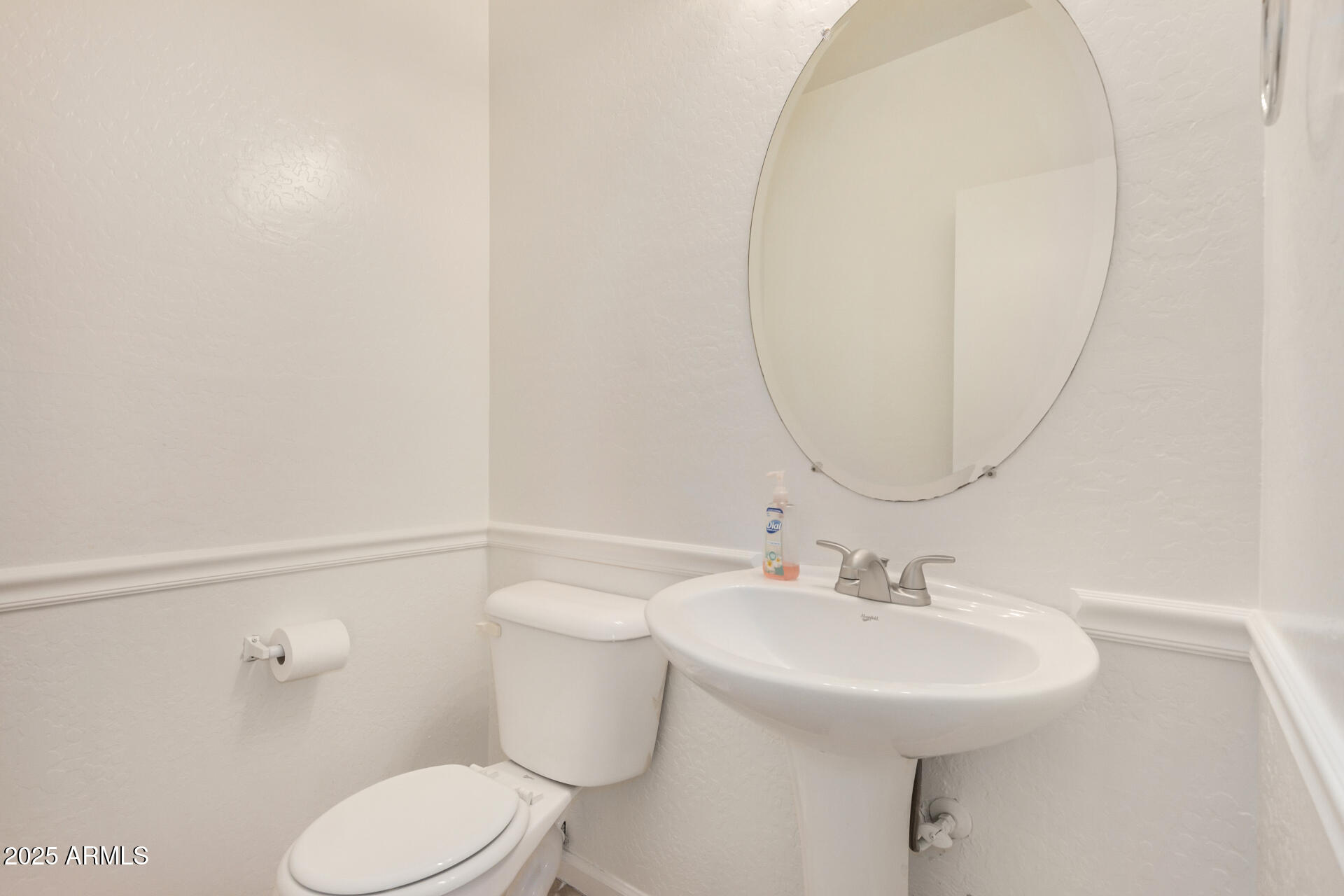 18475 North Madison Road Maricopa, AZ 85139 - Photo 16 of 40 a bathroom with a sink toilet and a mirror