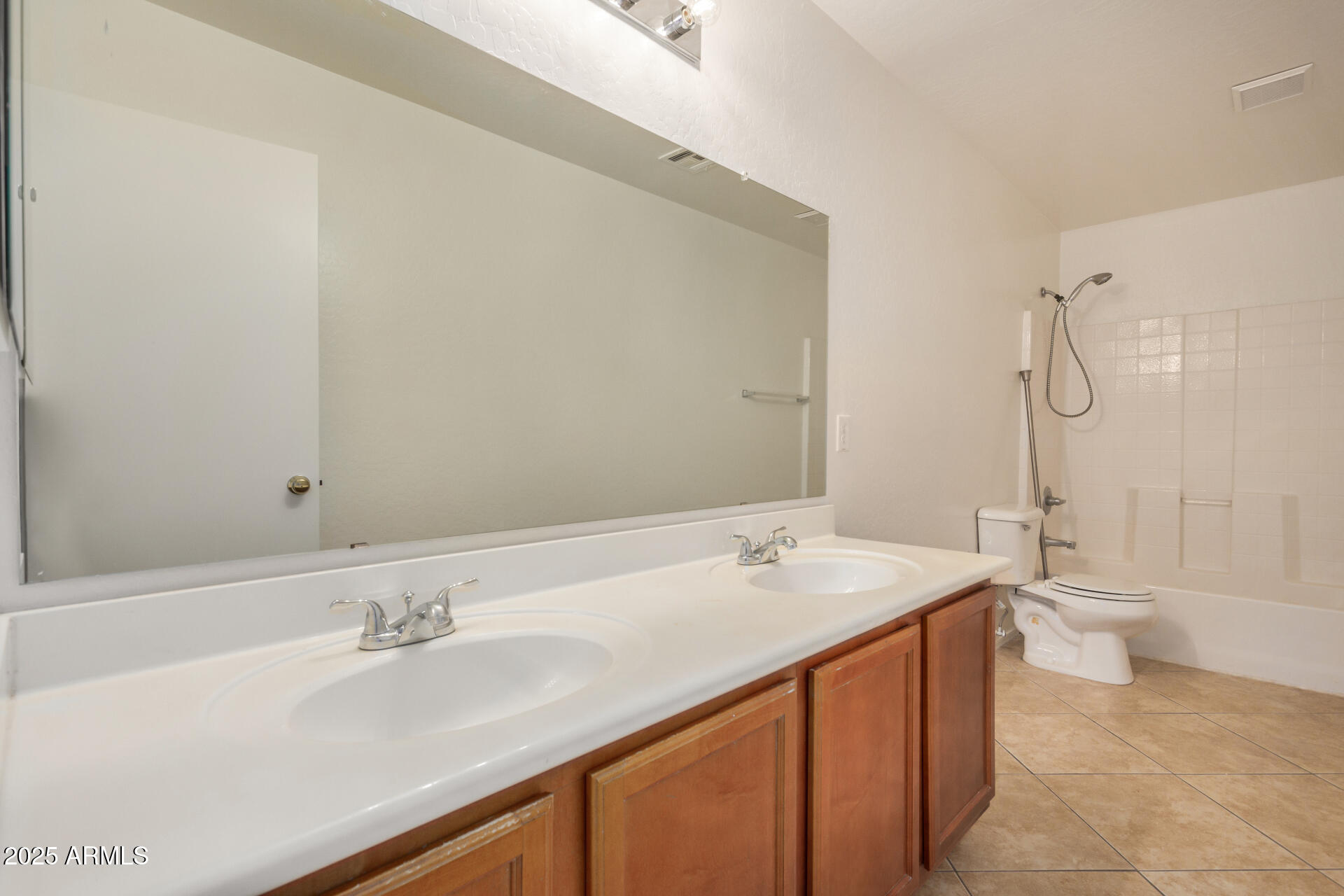18475 North Madison Road Maricopa, AZ 85139 - Photo 30 of 40 a bathroom with a sink a toilet and shower