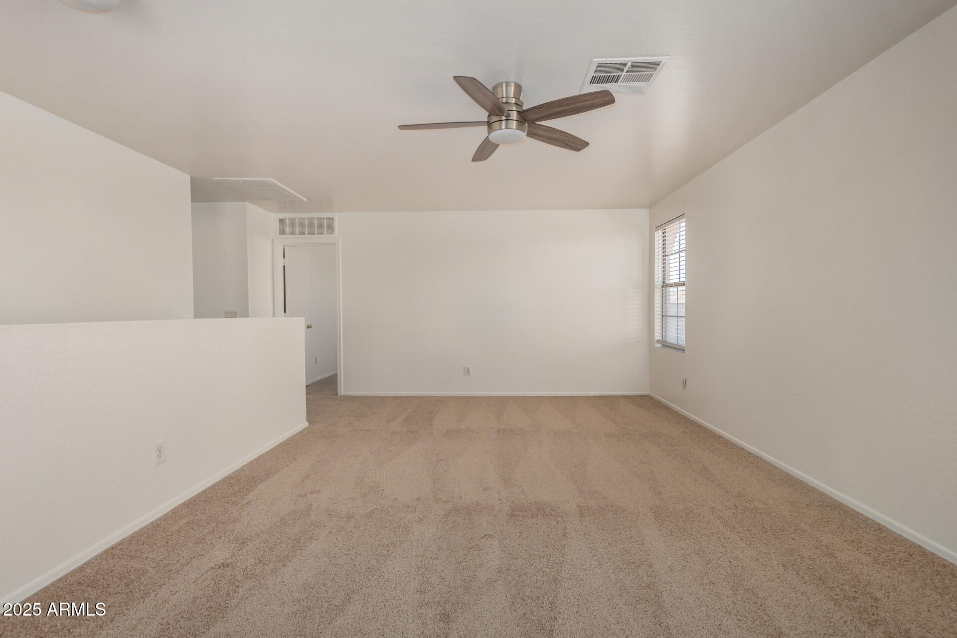 18475 North Madison Road Maricopa, AZ 85139 - Photo 32 of 40 a view of an empty room