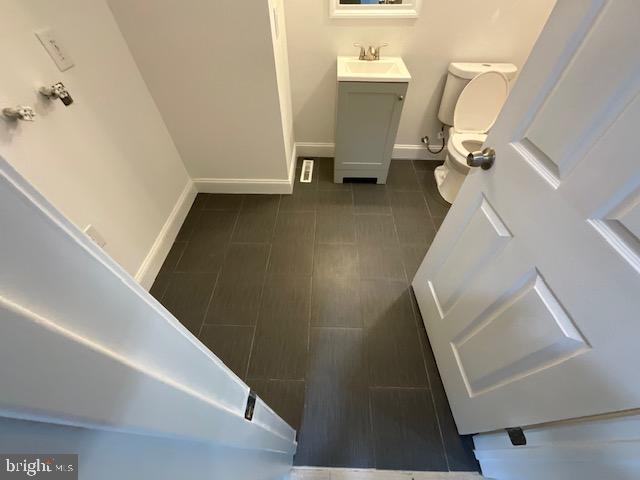 384 Post Boulevard Dover, DE 19904 - Photo 7 of 13 a view of a livingroom with a staircase