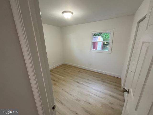 384 Post Boulevard Dover, DE 19904 - Photo 10 of 13 an empty room with a wooden door