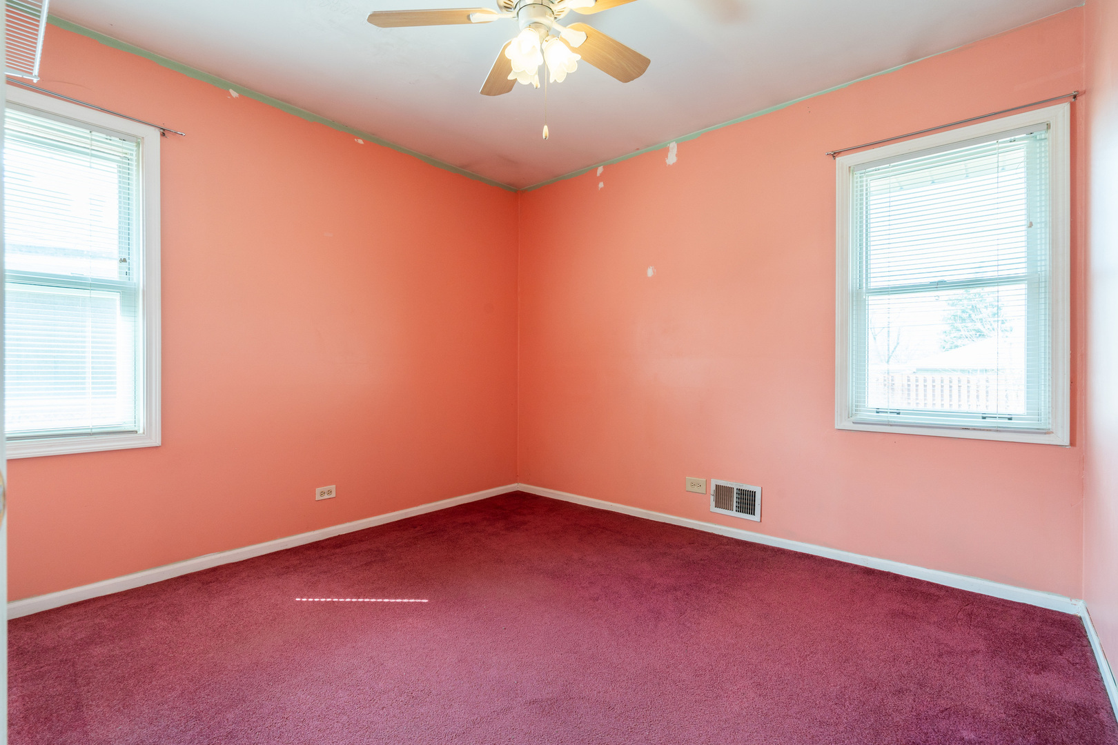5912 109th Place Chicago Ridge, IL 60415 - Photo 16 of 21 an empty room with a window and a fan