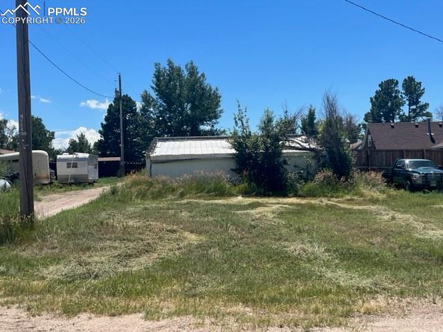 344 3rd Street Calhan, CO 80808 - Photo 3 of 5 a view of a backyard