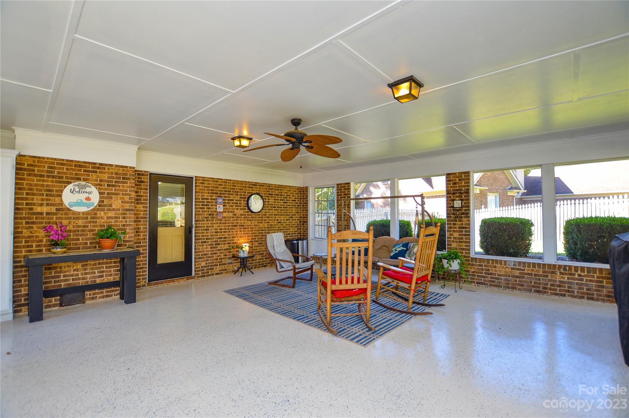 5215 Rocky River Road Charlotte, NC 28215 - Photo 30 of 33 a living room with furniture and flat screen tv