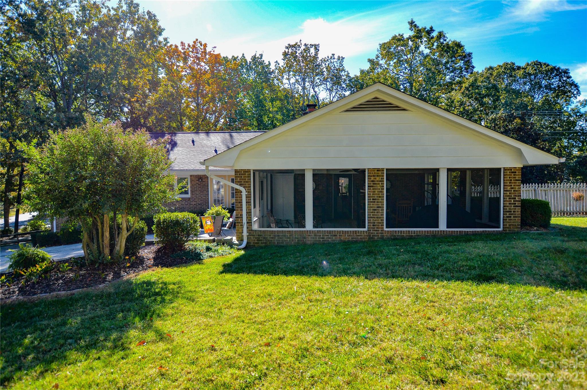 5215 Rocky River Road Charlotte, NC 28215 - Photo 32 of 33 a view of a house with a yard and garden