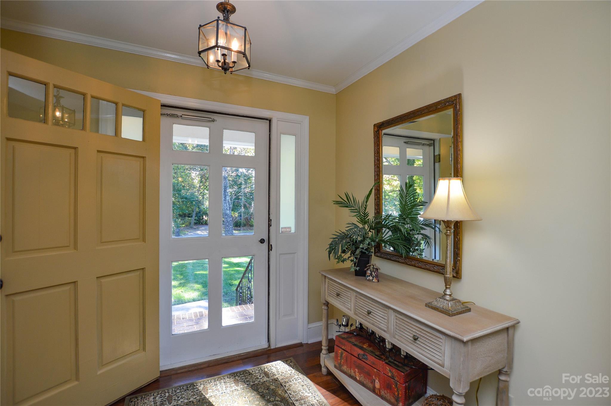 5215 Rocky River Road Charlotte, NC 28215 - Photo 4 of 33 a living room with furniture and a window