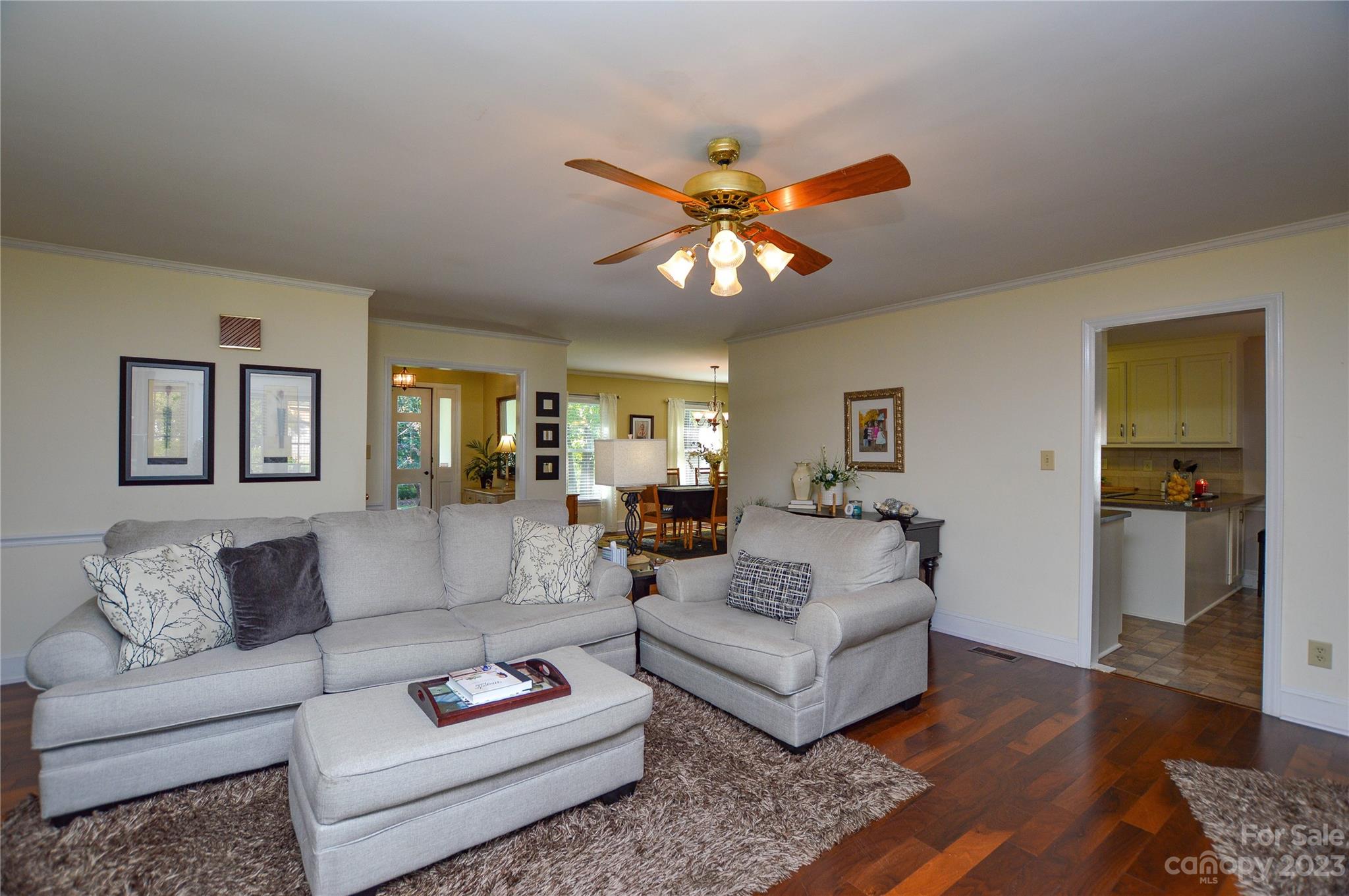 5215 Rocky River Road Charlotte, NC 28215 - Photo 7 of 33 a living room with furniture and a rug