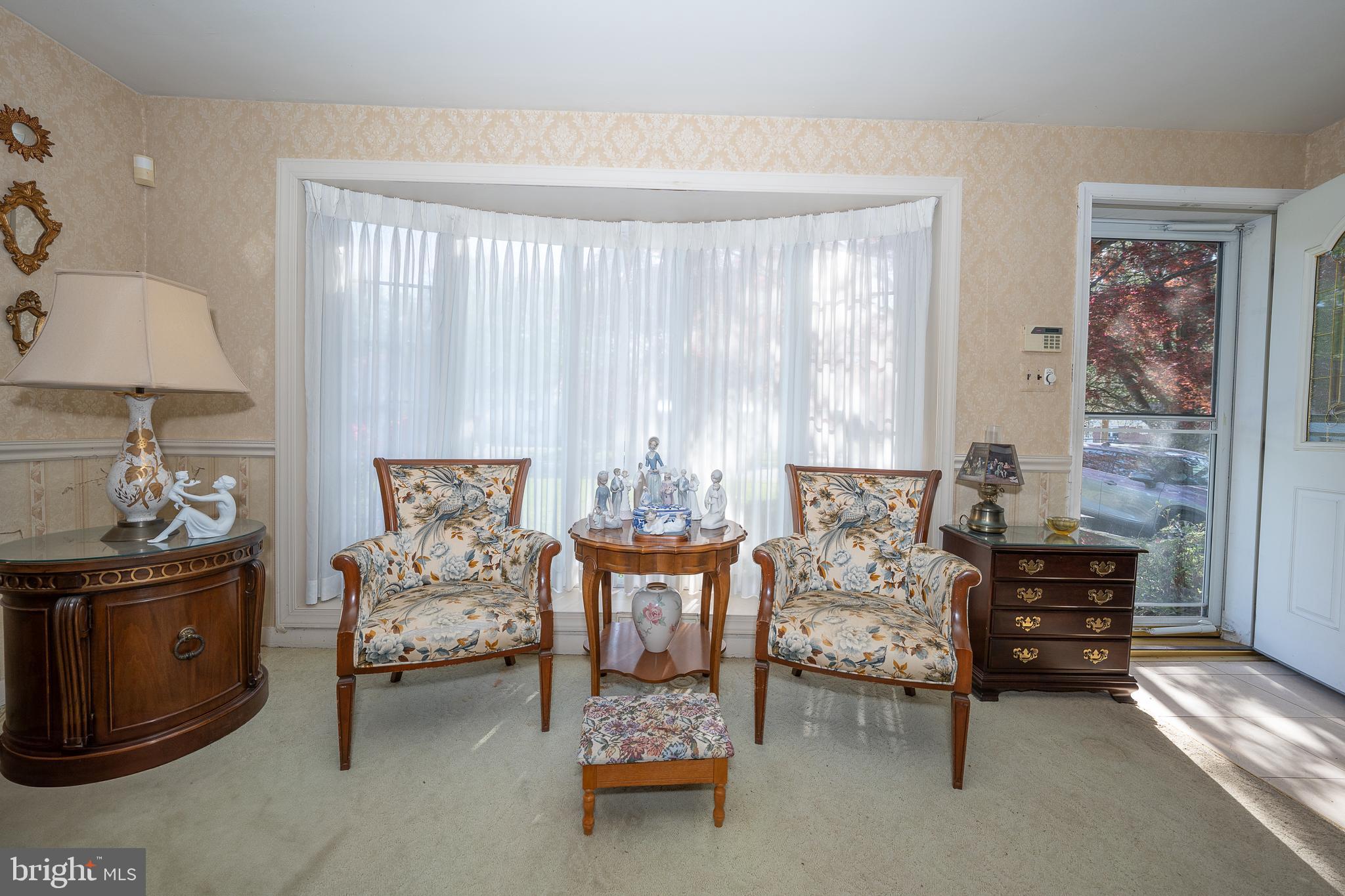 262 Lewis Road Springfield, PA 19064 - Photo 2 of 11 a bedroom with furniture and a window
