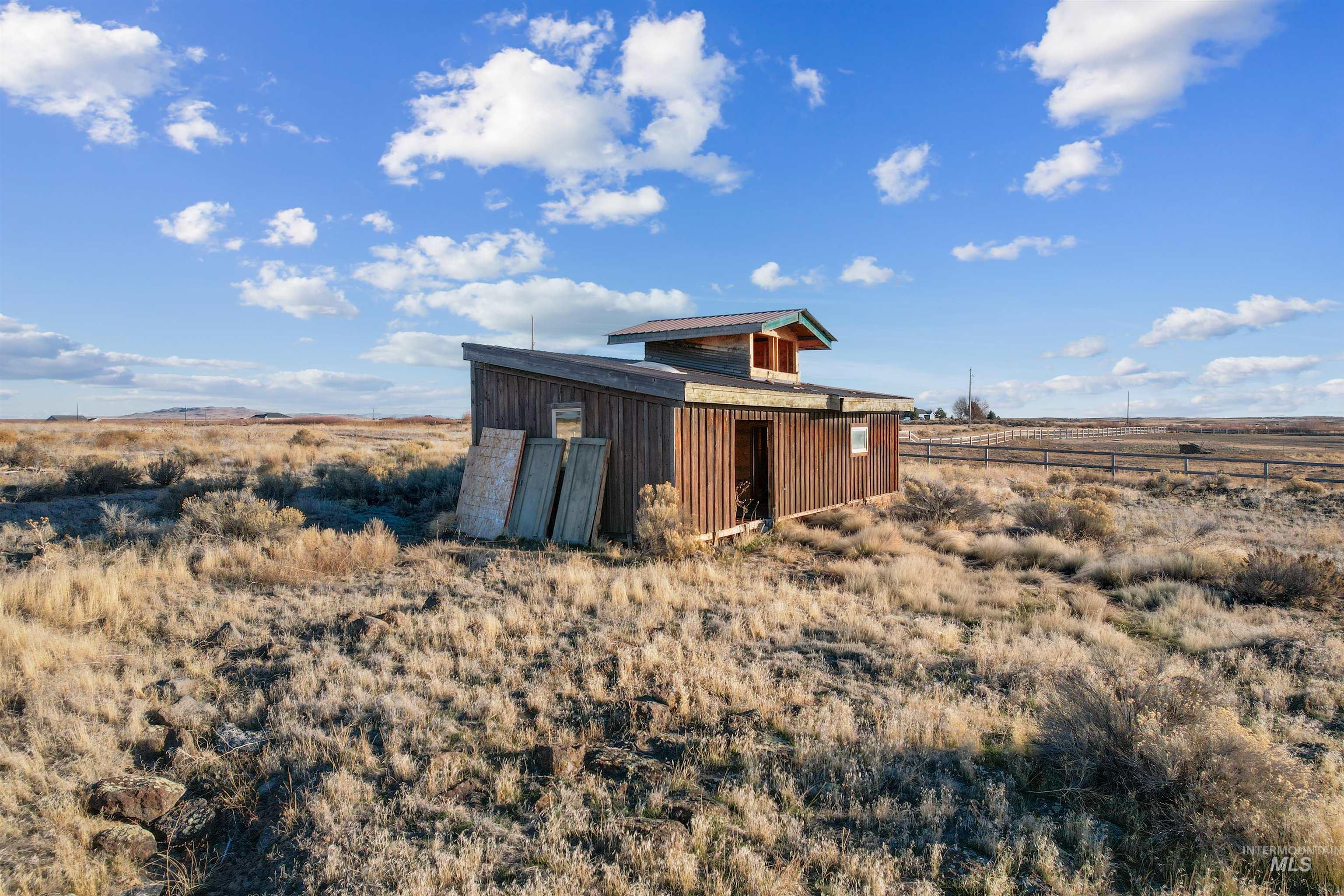 171 East 552 North Shoshone, ID 83352 - Photo 5 of 18 View of outdoor structure featuring a view of rural / pastoral area