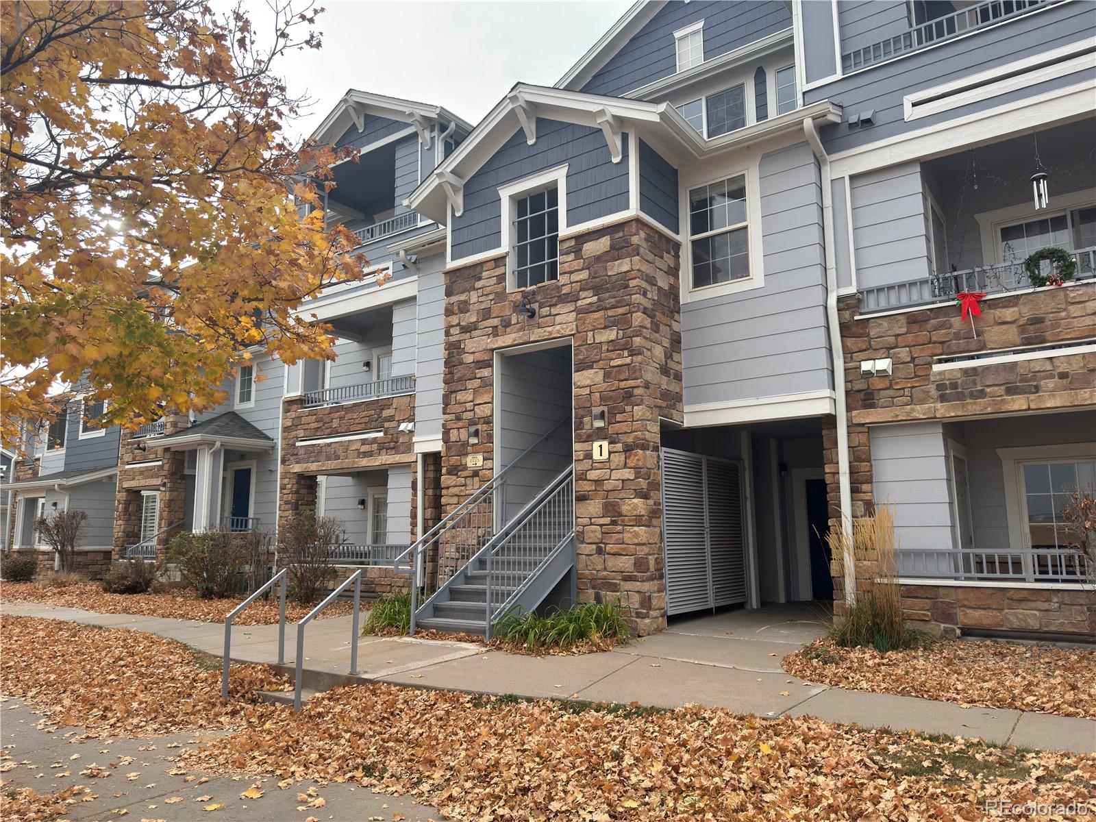 5255 Memphis Street, Unit 121 Denver, CO 80239 - Photo 1 of 9 a brick building with a large windows