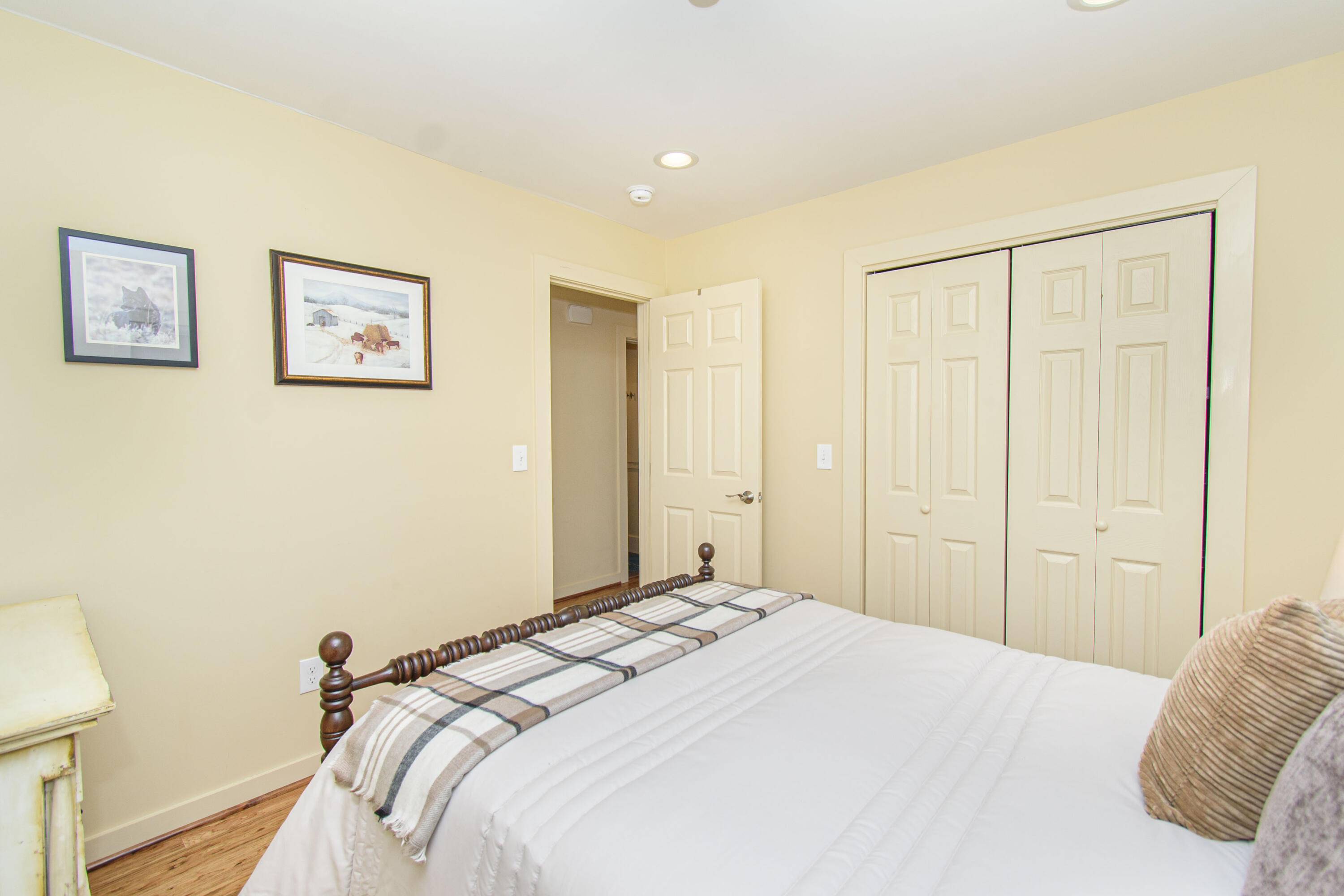 5600 Mt Tabor Road Blacksburg, VA 24060 - Photo 68 of 99 a bedroom with a bed and a mirror