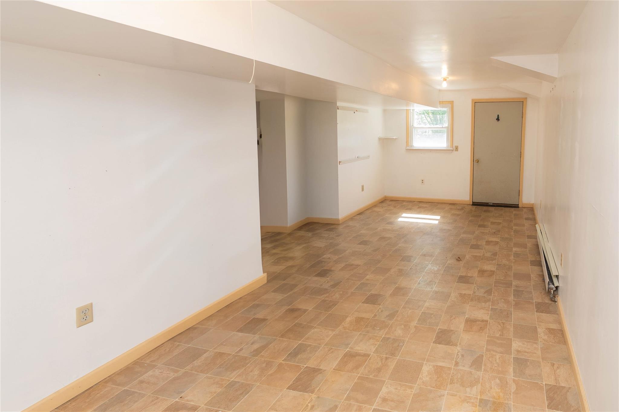 57 East Rock Cut Road Walden, NY 12586 - Photo 18 of 27 Spare room featuring a baseboard radiator and baseboards