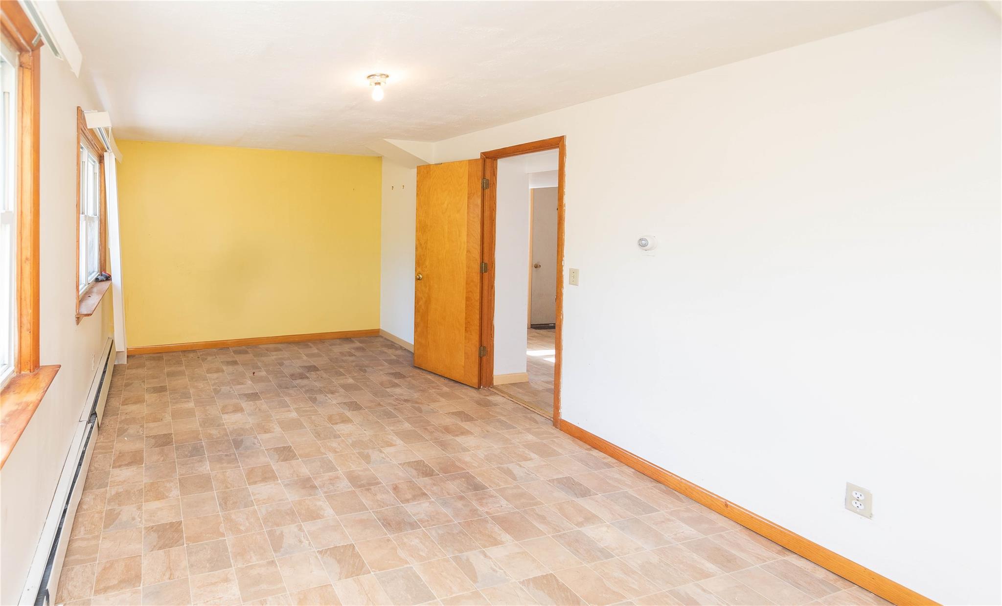 57 East Rock Cut Road Walden, NY 12586 - Photo 19 of 27 Spare room featuring baseboards and a baseboard radiator