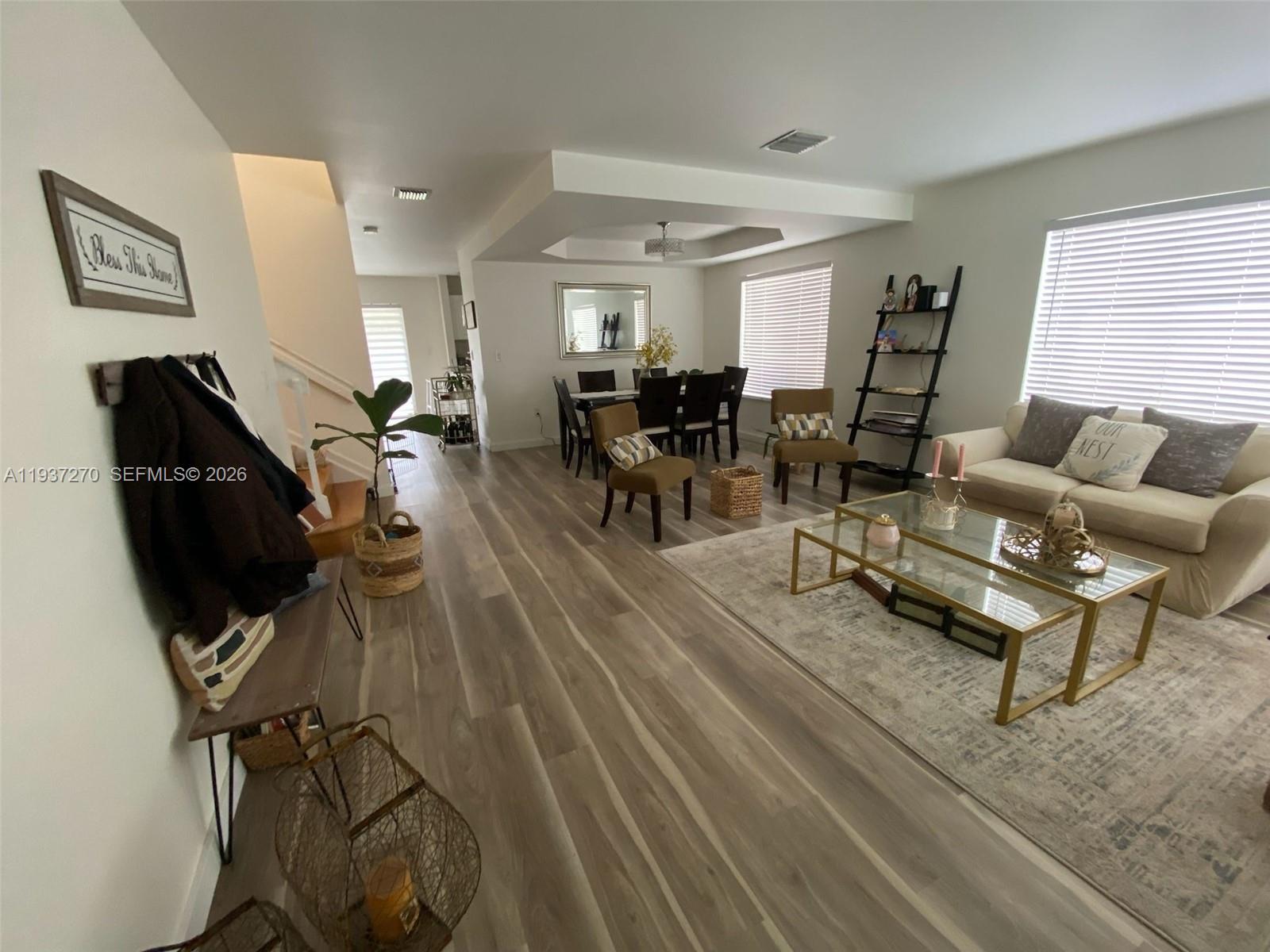 15442 Southwest 139th Street Miami, FL 33196 - Photo 13 of 27 a living room with furniture