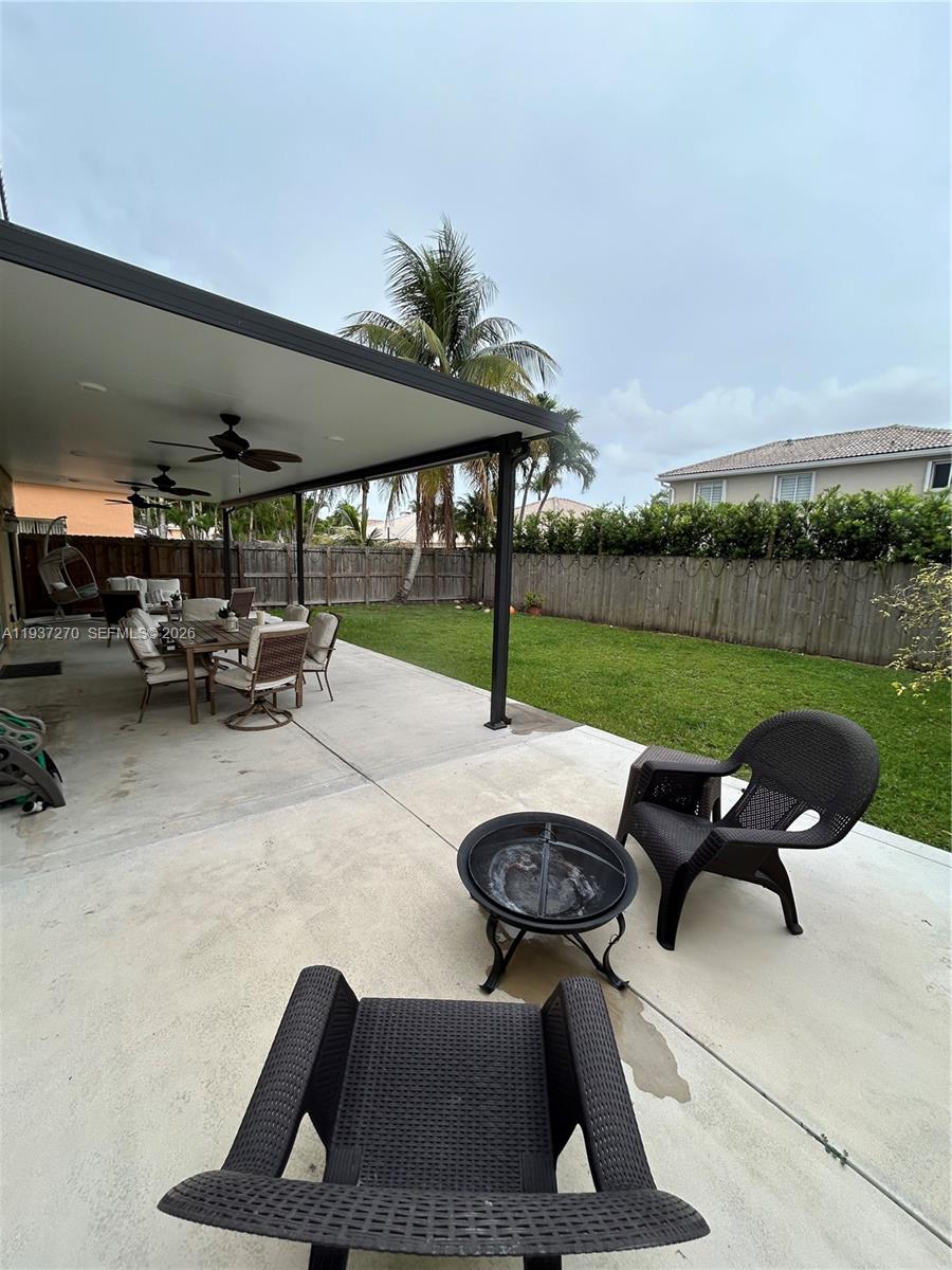 15442 Southwest 139th Street Miami, FL 33196 - Photo 23 of 27 a view of outdoor space yard and patio